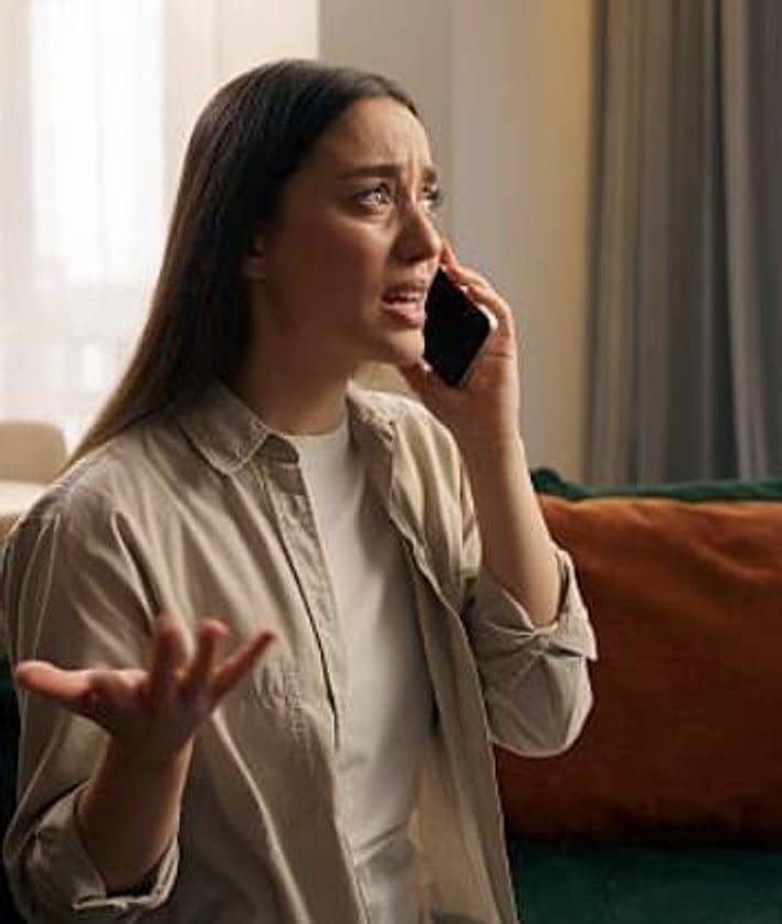 A person discussing their account over the phone